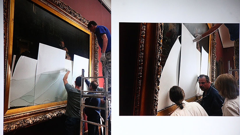 Grupos de restauradores intentando conservar el cuadro